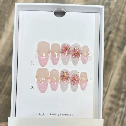 Set of 10 French almond-shaped press-on nails with flower design by Blushimmer, wearable false nails for women.