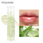 Blushimmer moisturizing water lip gloss in transparent mirror crystal jelly glass container, plumping and hydrating lip makeup.