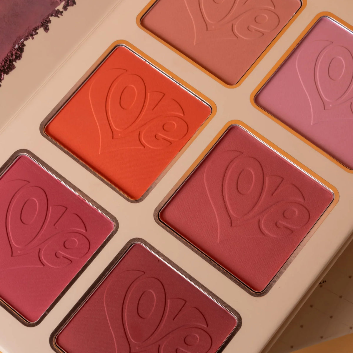 Blushimmer 43-color all-in-one makeup palette with 4-layer book design featuring matte and shimmer eyeshadows, blush, contour, and highlighter.