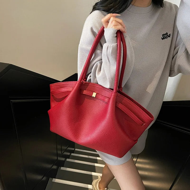 Luxury soft PU leather tote bag by Worldfone Direct Store, spacious women’s crossbody bag for commuting and travel.