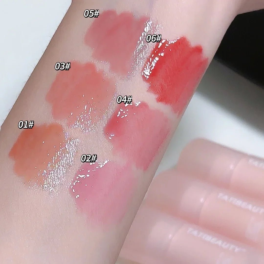 Blushimmer DIKALU water lip gloss in crystal jelly, showing a shiny, tinted, hydrating lipstick on lips with a glossy finish.