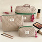 Pink Blushimmer Airfriend makeup bag with soft fabric, designed for women’s travel toiletries and cosmetic organization.