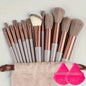 Set of Blushimmer makeup brushes including foundation, powder, eyeshadow, kabuki, and blending brushes for professional cosmetic application