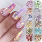 Iridescent mixed hexagon nail glitter sequins and holographic flakes for nail art and gel polish manicure by Blushimmer.