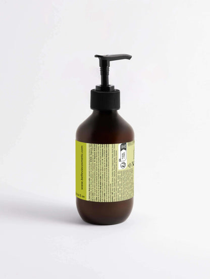 Silk Skin Body Serum in a 270ml bottle with woody amber and leather scent, featuring a sleek pump dispenser and elegant packaging.