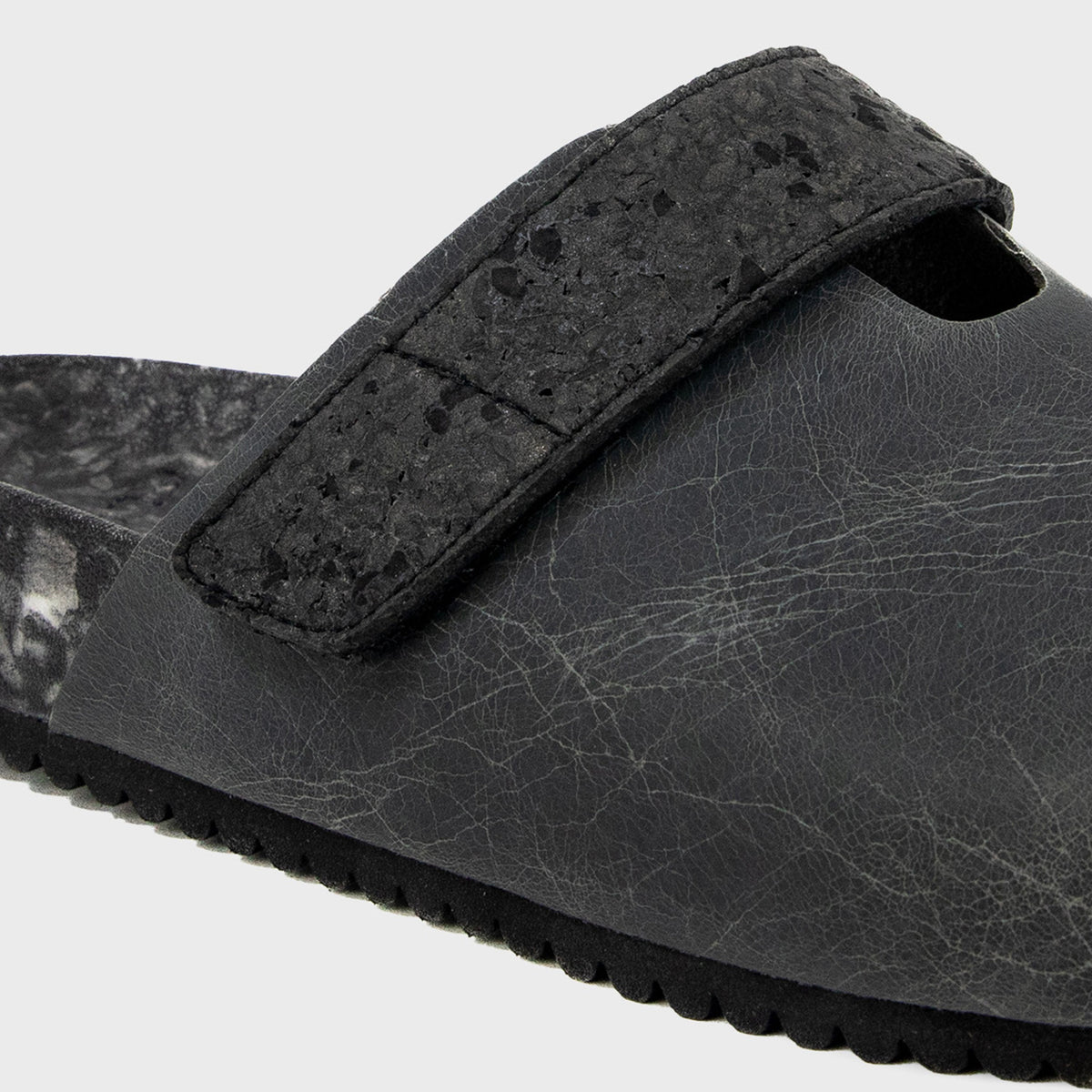 Fleks More Mesa Clog in After Dark color, shown from a side angle, highlighting its stylish design and comfortable fit.