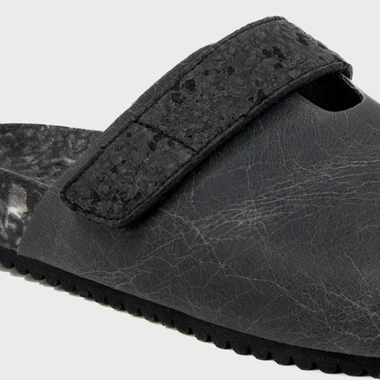 Fleks More Mesa Clog in After Dark color, shown from a side angle, highlighting its stylish design and comfortable fit.