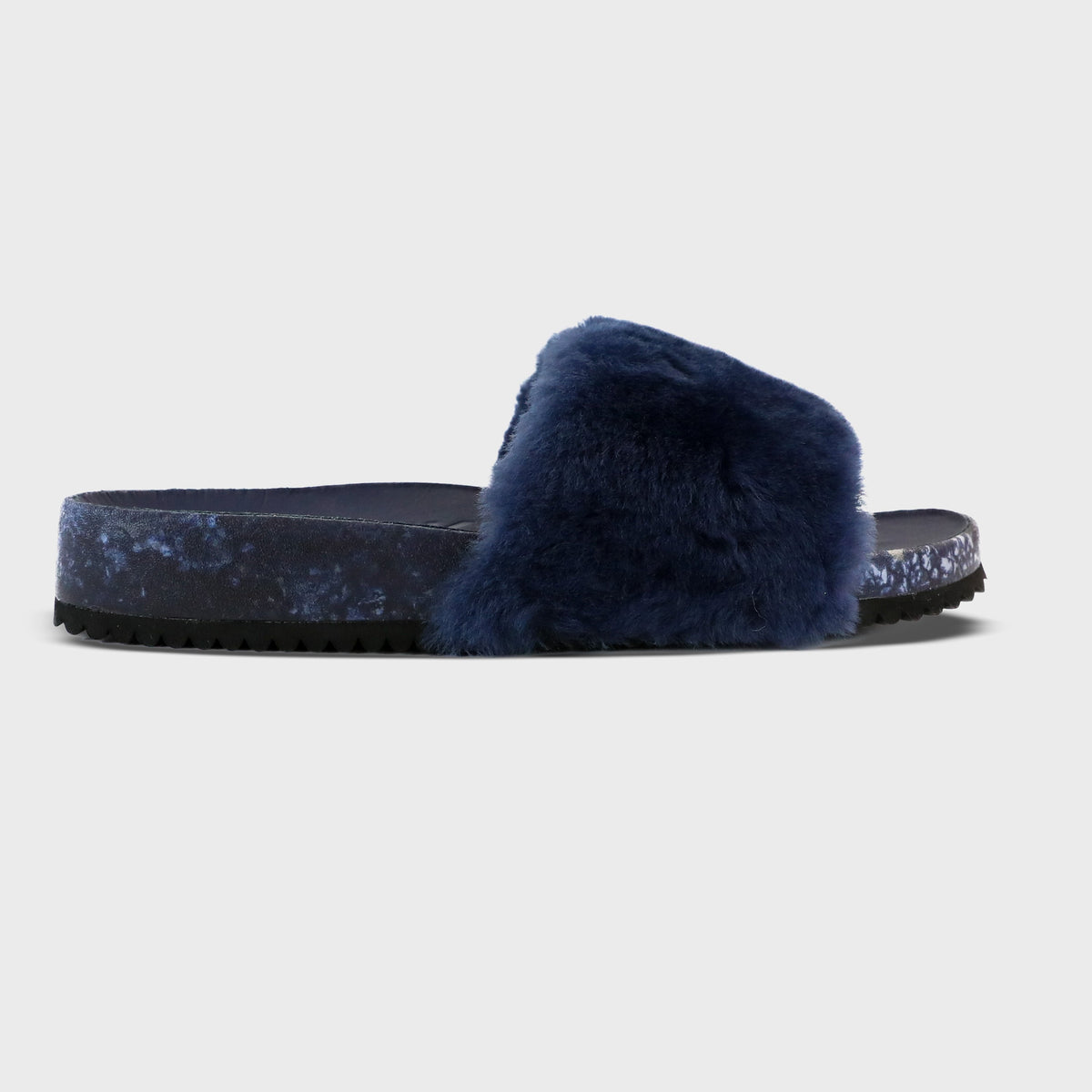 Fleks San Ysidro Slide in Deep Blue Sea, a stylish and comfortable slide sandal profile with deep blue color.