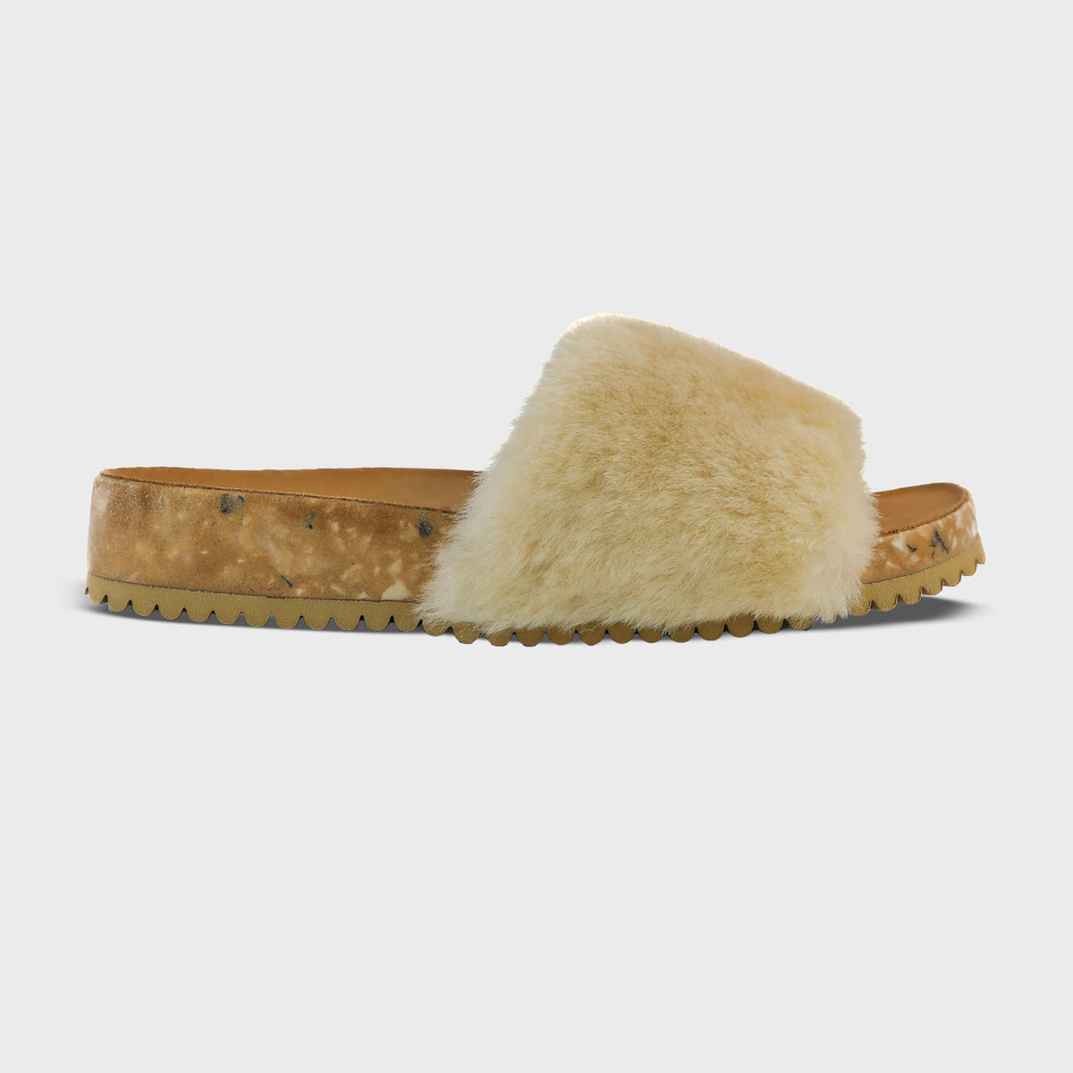 Fleks San Ysidro Slide in tan, showcasing a comfortable slip-on sandal with a simple strap design and casual style.