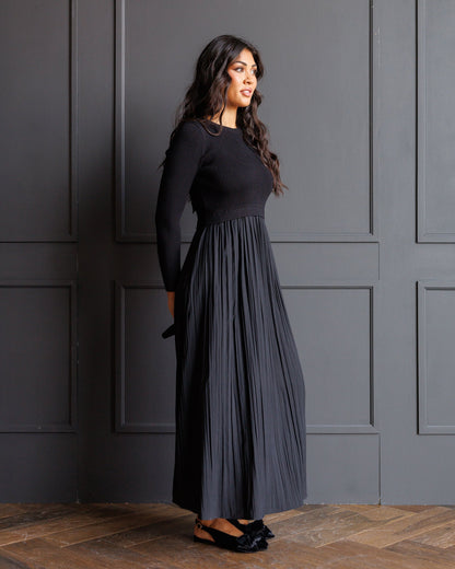 Downeast Soho satin dress, elegant sleeveless women's dress with a smooth, shiny fabric and classic fit, perfect for special occasions.