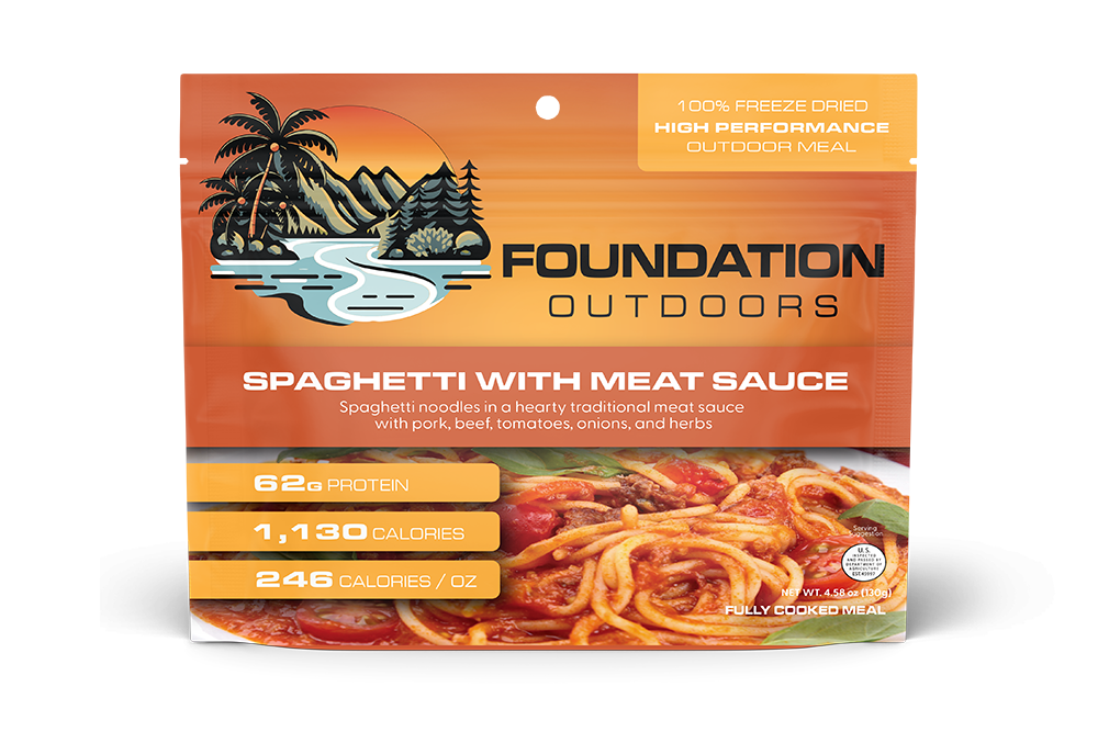 Foundation Outdoors spaghetti with meat sauce meal in a pouch, showing cooked spaghetti topped with savory meat sauce.