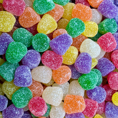 Assorted Spice Drops gummy candies in a bulk value bag from Candy In Bulk, colorful spicy-flavored gummy candies on a white background.