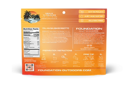 Back view of FOUNDATION Outdoors spicy Italian pork sausage risotto meal pouch showing product packaging and branding.