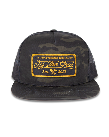 Black camo stamped snapback hat by Off The Grid Surplus with a bold stamped logo on the front.