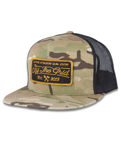 Multicam stamped snapback hat by Off The Grid Surplus featuring a bold stamped design on the front.
