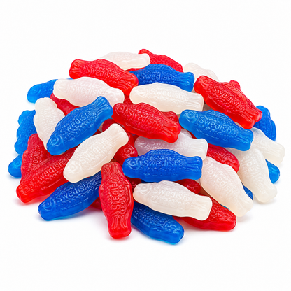 Assorted Swedish Fish Mini candies in red, white, and blue from Candy In Bulk, shown in a bulk value bag.