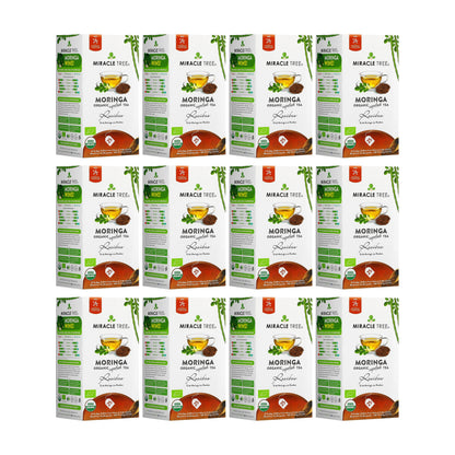 Organic Moringa and Rooibos herbal tea in a clear glass mug, showcasing its vibrant green and reddish-brown colors.