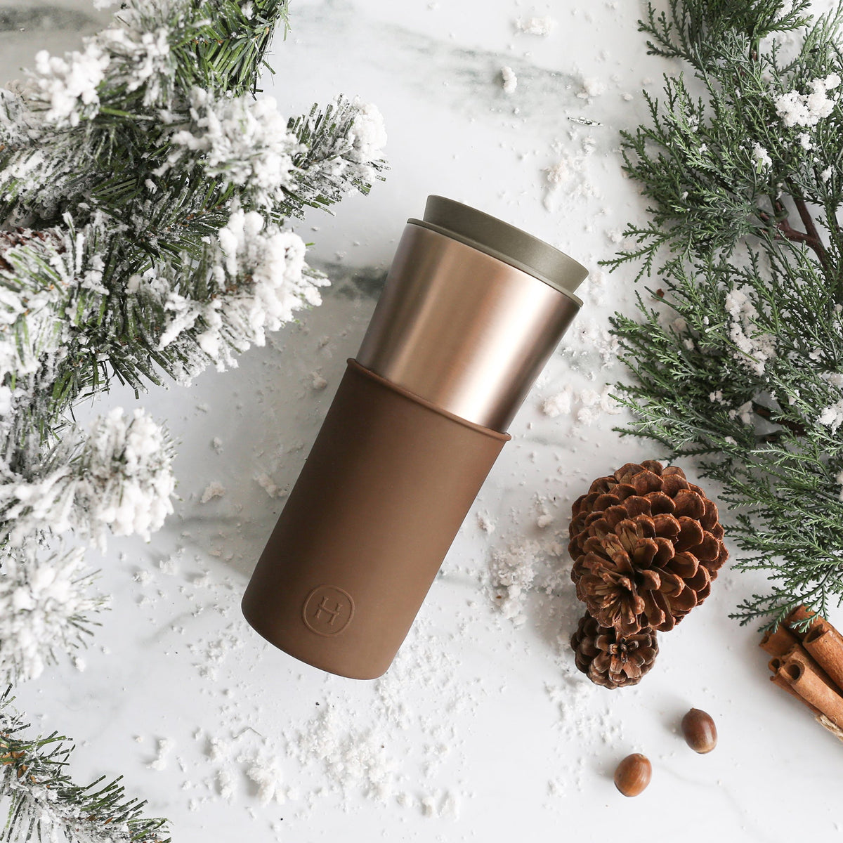 HYDY Metallic Fir Mocha Travel Mug, 15 oz, with a sleek mocha-colored exterior and stainless steel construction.