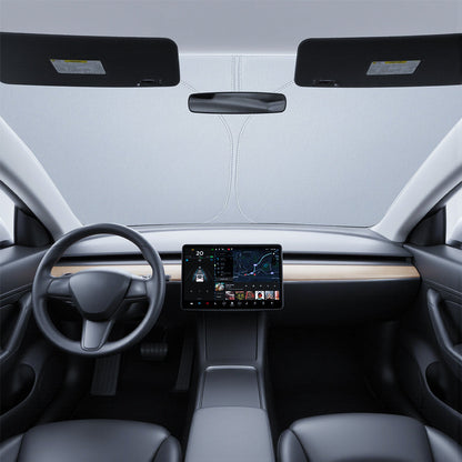 Graphene front windshield sunshade for Tesla Model 3 Highland and Model Y Juniper, blocking sunlight and reducing interior heat.