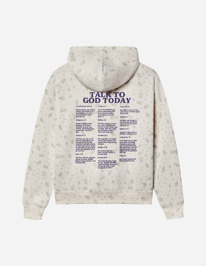 Unisex hoodie by Elevated Faith featuring a vibrant wildflower pattern with "Talk to God" text across the front.