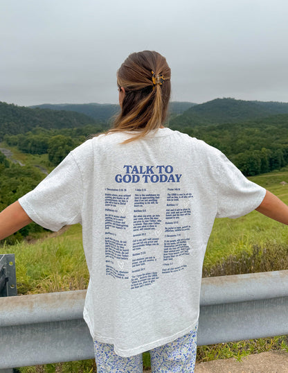 Unisex T-shirt from Elevated Faith featuring a spiritual design with the phrase "Talk to God" on a comfortable casual tee.