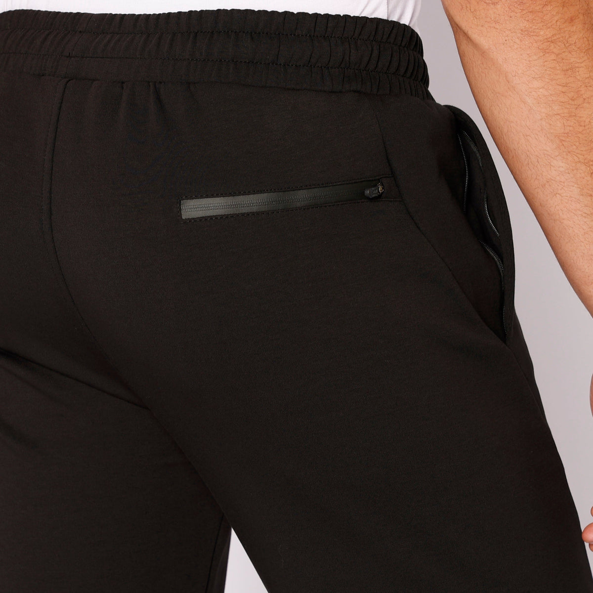Black SCR Sportswear men's athleisure sweatpants with a straight-leg fit, designed for tall men, made for comfort and activewear.