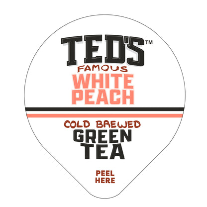 Glass of Ted's Famous White Peach Cold Brewed Green Tea by Java House, showcasing a refreshing tea with white peach flavor.