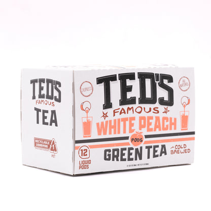 Glass of Ted's Famous White Peach Green Tea by Java House, showcasing a refreshing cold brew tea with white peach flavor.