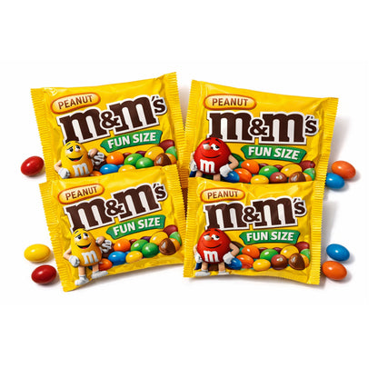 Assorted M&M's Peanut Milk Chocolate Candy fun size packs from Candy In Bulk in a bulk value bag, showing colorful candy-coated chocolates.