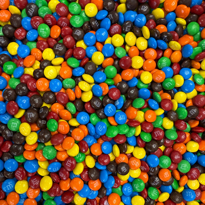 Assorted M&M's Minis Milk Chocolate Candy in a bulk value bag from Candy In Bulk, showing colorful chocolate candies.