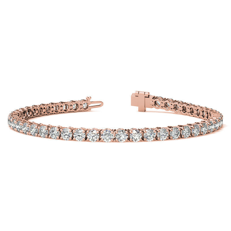 Rose gold VOSSAGIN 6ctw created sapphire tennis bracelet with 3mm stones on a delicate gold overlay chain.