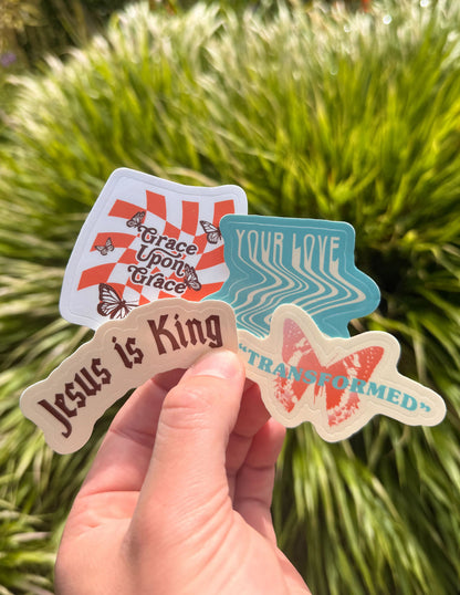 Set of throwback-themed stickers from Elevated Faith in a pack, featuring nostalgic designs on a clear sheet.