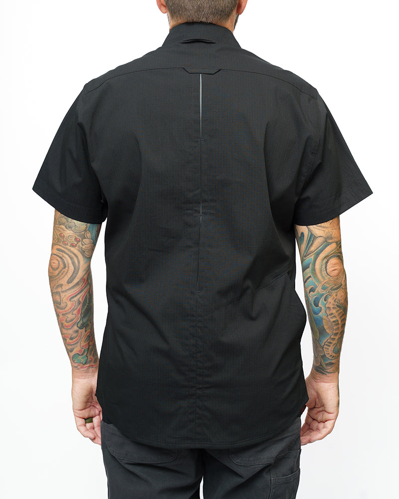Vintage black Thunderbolt SS shirt by Off The Grid Surplus featuring short sleeves and a bold lightning bolt design.