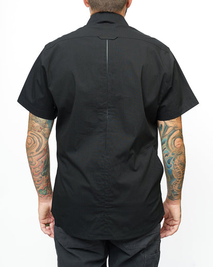 Vintage black Thunderbolt SS shirt by Off The Grid Surplus featuring short sleeves and a bold lightning bolt design.