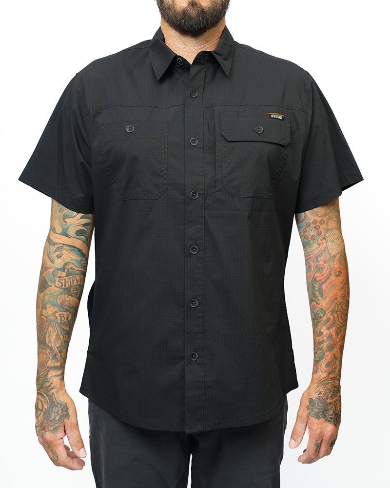 Vintage black Thunderbolt SS shirt by Off The Grid Surplus, short sleeve design with a bold thunderbolt graphic on the front.