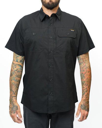 Vintage black Thunderbolt SS shirt by Off The Grid Surplus, short sleeve design with a bold thunderbolt graphic on the front.