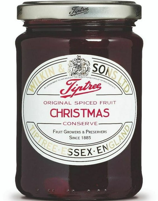 Tiptree Spiced Christmas Conserve jar, 340g, with festive labels and a spoonful of spicy fruit conserve ready to serve.