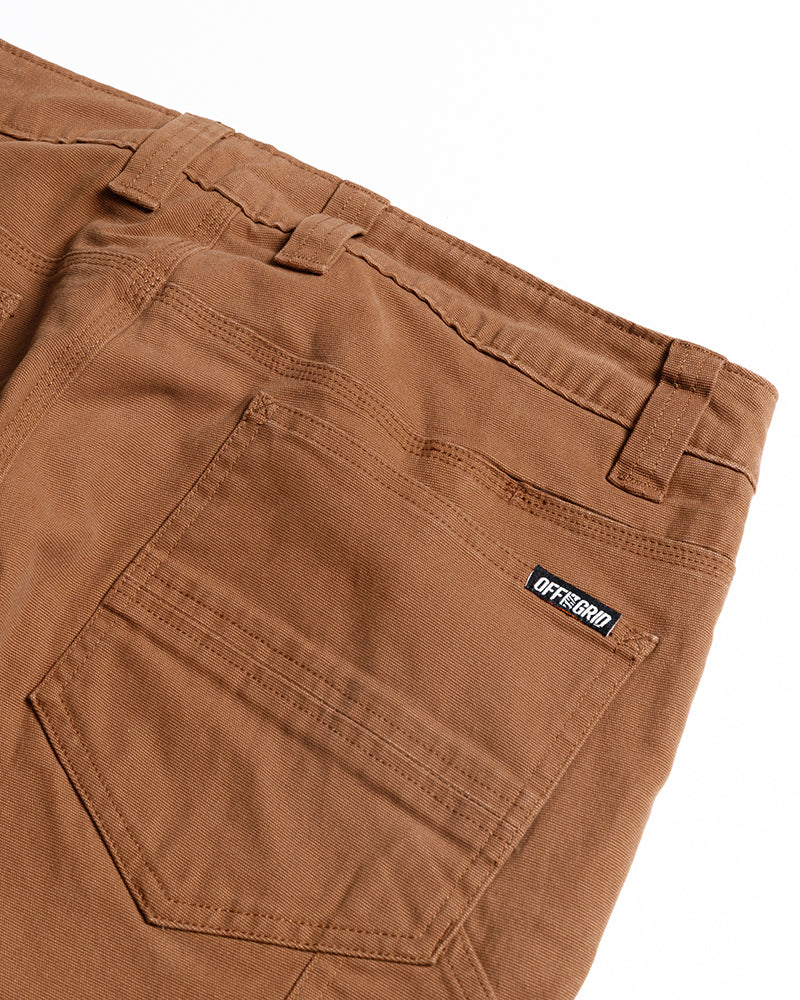 Off The Grid Surplus hardened double knee pants in tobacco color, showing durable fabric and reinforced knee areas.