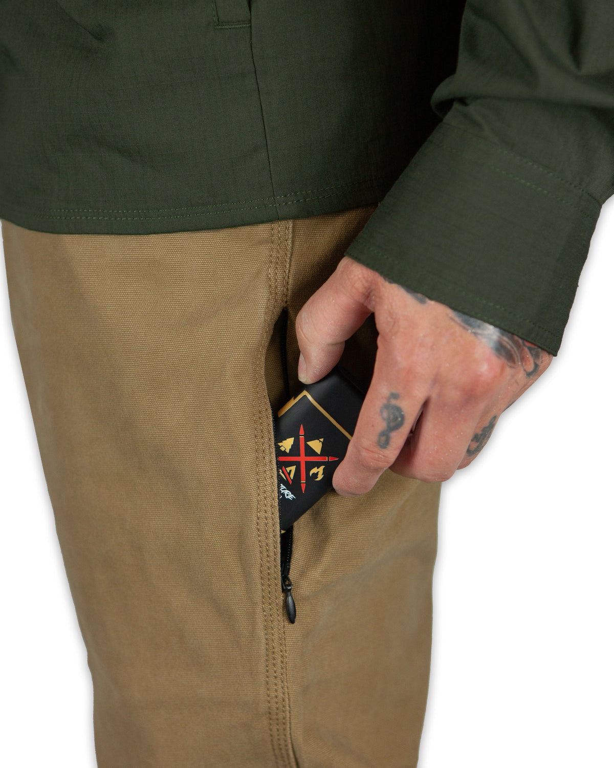 Off The Grid Surplus Trailblazer Boot Cut Pants in Coyote color, showing the sturdy fabric and classic fit for outdoor adventures.