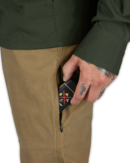 Off The Grid Surplus Trailblazer Boot Cut Pants in Coyote color, showing the sturdy fabric and classic fit for outdoor adventures.