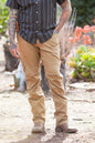 Off The Grid Surplus Trailblazer Boot Cut Pants in coyote color, showcasing durable fabric and relaxed fit, ideal for outdoor adventures.