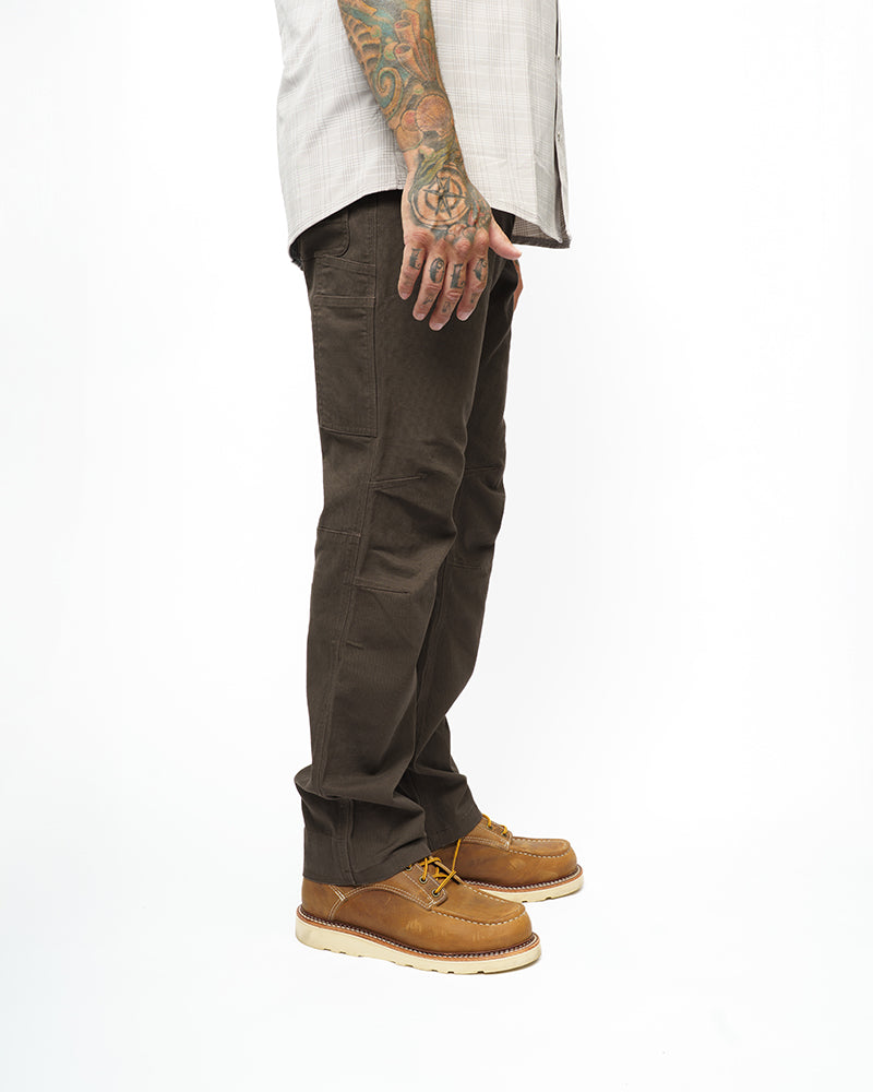Trailblazer standard fit pants in dark brown by Off The Grid Surplus, shown in a natural pose highlighting the durable fabric and classic style.