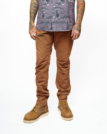 Off The Grid Surplus Trailblazer Taper Fit Pants in tobacco color, showing the tapered leg design and durable fabric.