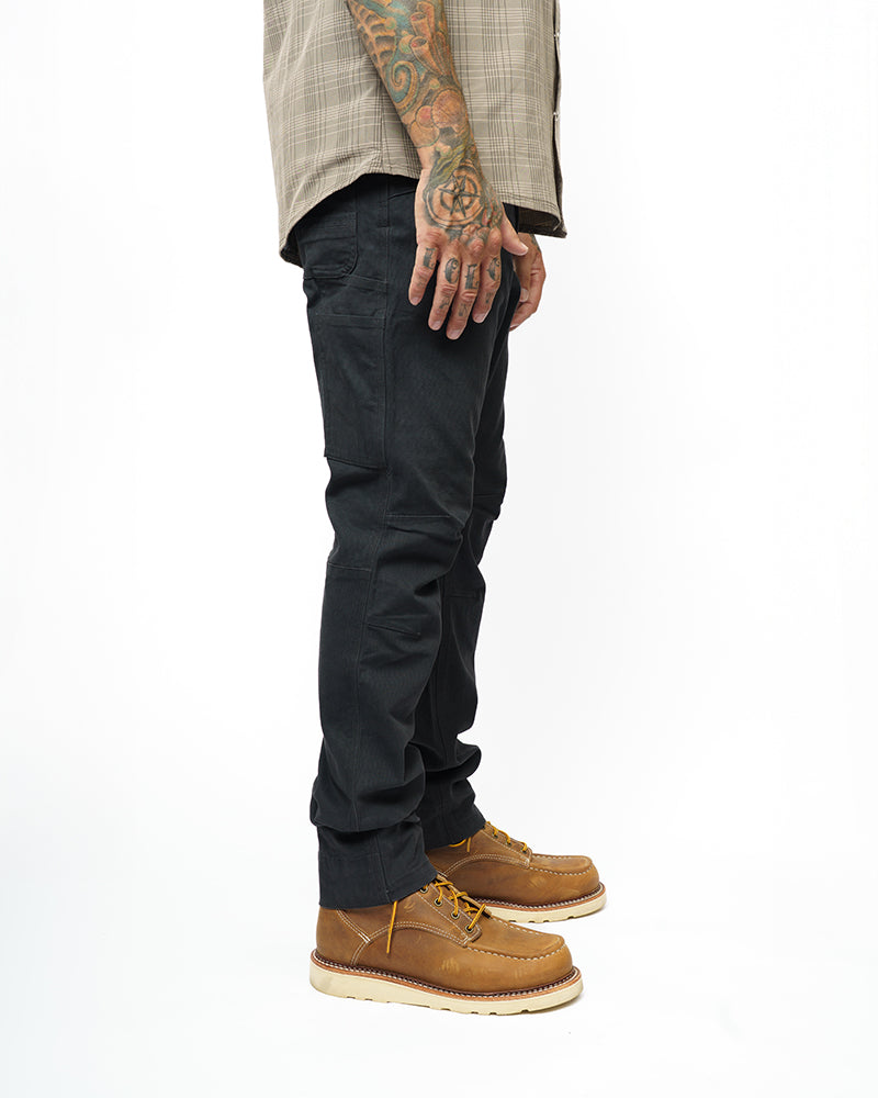 Off The Grid Surplus Trailblazer Taper Fit Pants in vintage black, showing slim fit design and durable fabric detail.