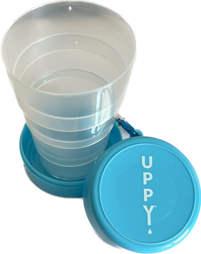 Uppy! On-The-Go Cup with effervescent tablet holder, transparent hydration bottle for electrolyte drinks, open with logo visible.