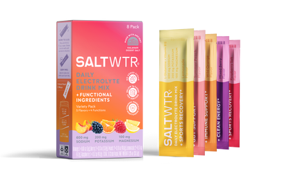 SaltWTR Variety Pack with eight transparent bottles of flavored electrolyte salts, showcasing different colorful labels.