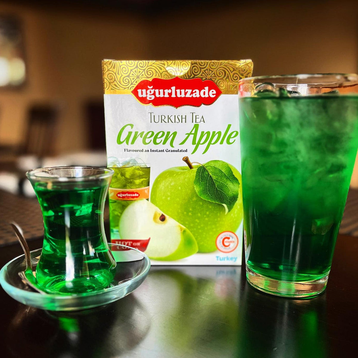 S101 Ugurlu Green Apple Fruit and Herbal Tea box featuring vibrant green apple tea leaves and packaging.