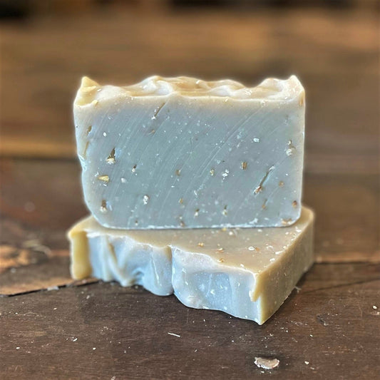 Unscented Soaplicity shaving soap in a plain container, showing a smooth, creamy lather ideal for a close shave.