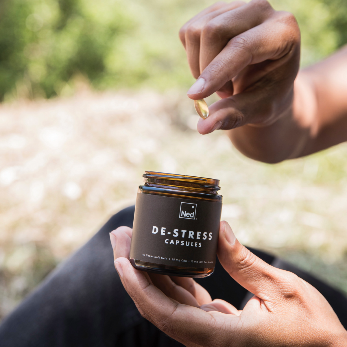 Foria De-Stress Capsules, natural supplement capsules with herbal ingredients for relaxation and stress relief.
