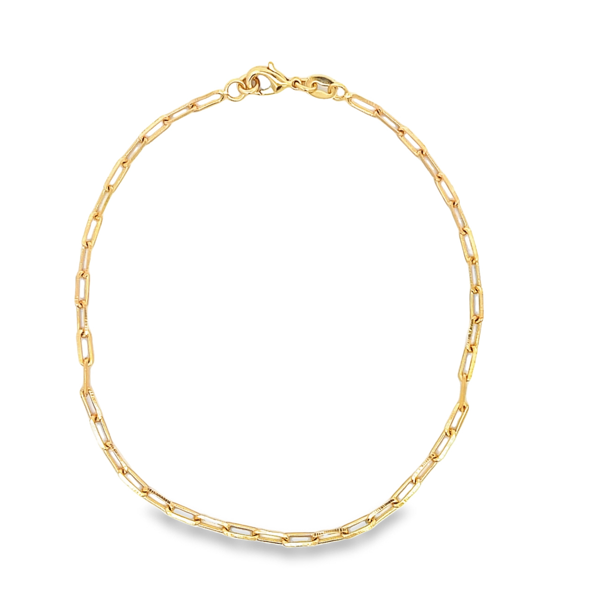 MIA Jewelry paper clip chain anklet featuring interconnected silver loops on a delicate chain for ankle jewelry.